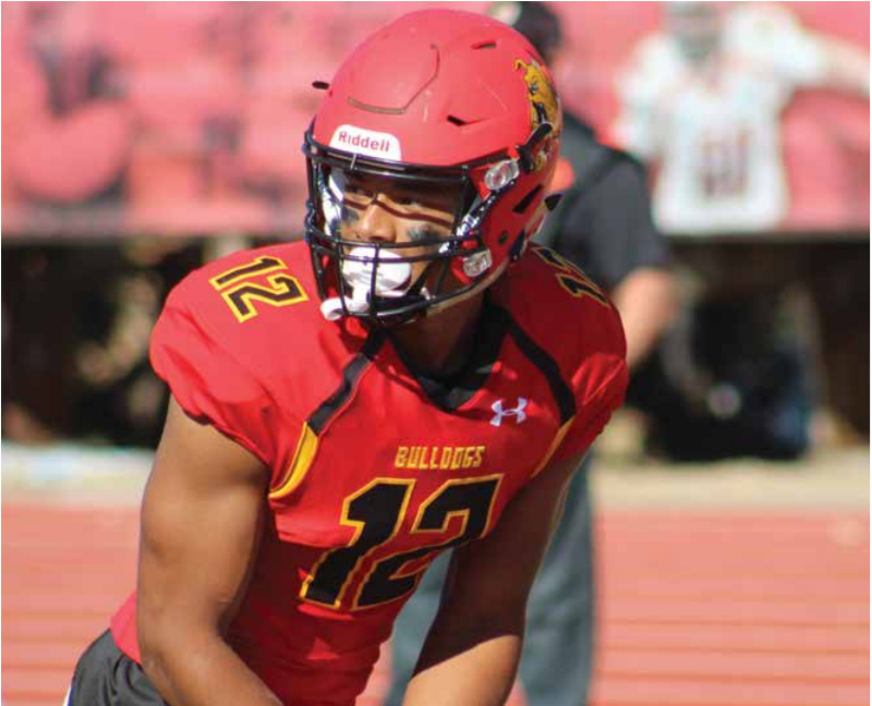Wide receiver, Malik Taylor, lines up for the snap.
