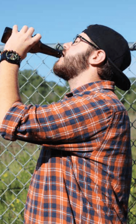 Ferris construction junior Charlie Zitta enjoys a cold one as a way to unwind after class.
