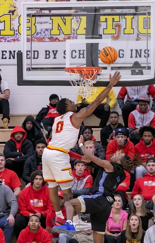 Walt Kelser attacks the basket for a layup during Ferris’s victory over Grand Valley. 