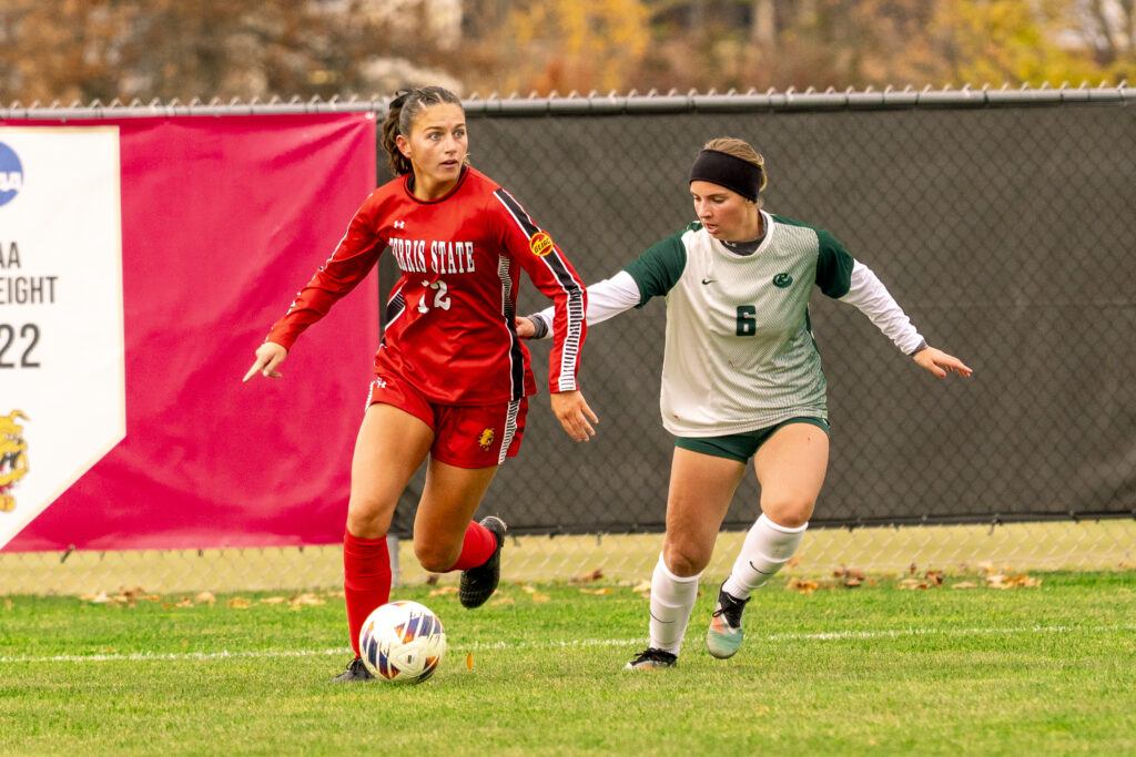 Emerson Lukomski dribbles the ball against a Roosevelt defender.