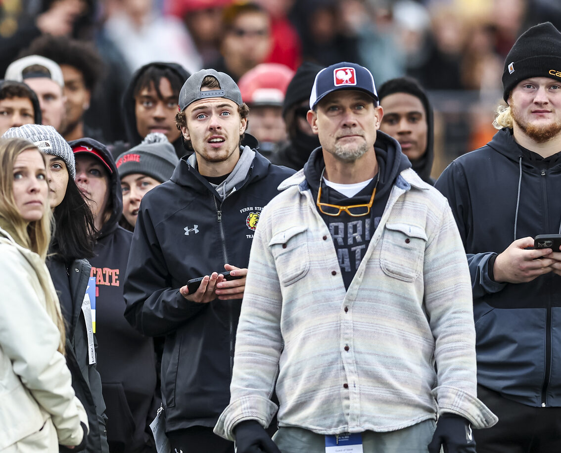 Brandon Wirth (left) on the sidelines during the 2023 Anchor-Bone classic at Lubbers Stadium in Allendale, MI.
