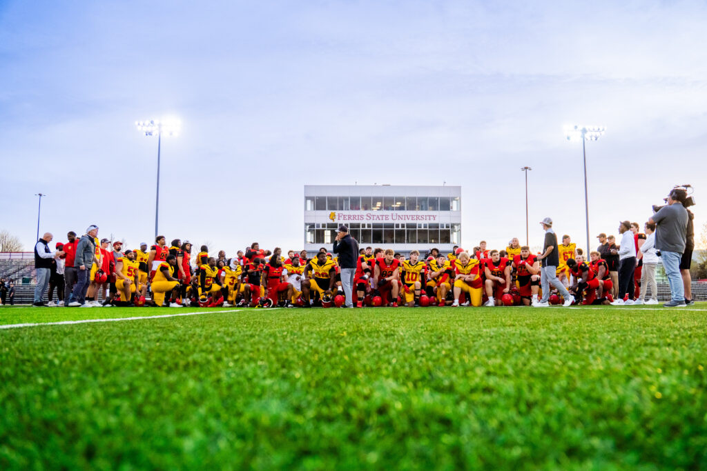 Head Coach Tony Annese talks to his entire team after the scrimmage.